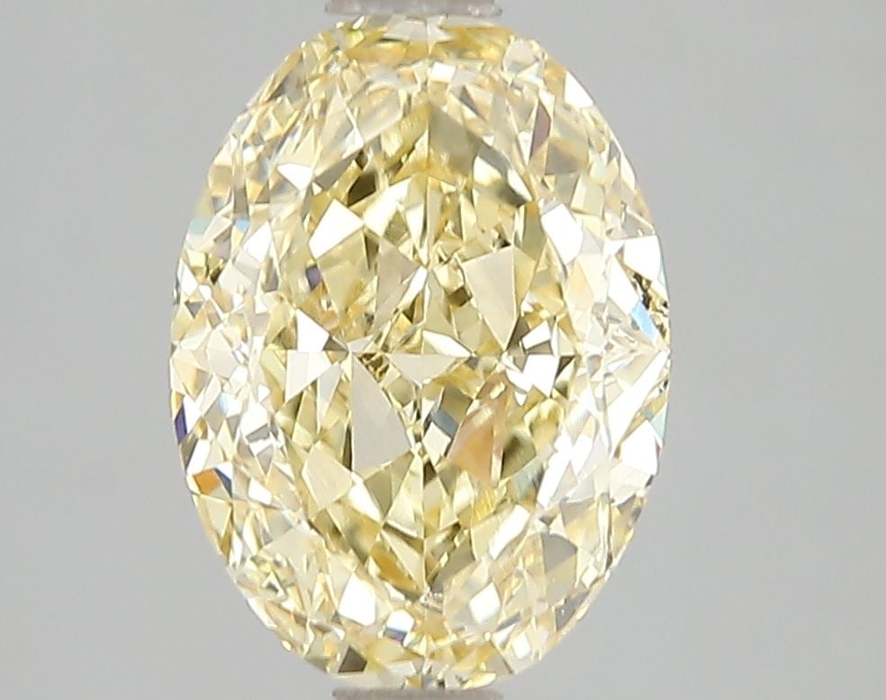 Loose Diamond - OVAL 3.01ct Fancy Vivid Yellow VS1: Loose Diamond - OVAL 3.01ct Fancy Vivid Yellow VS1 Source: This is a real non-mined Diamond that has been grown in a lab Shape: OVAL Carats: 3.01 Color: Fancy Vivid Yellow Certification: IGI Video: