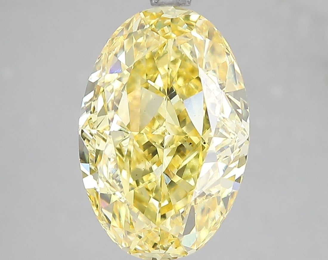 Loose Diamond - OVAL 5.19ct Fancy Vivid Yellow VS1: Loose Diamond - OVAL 5.19ct Fancy Vivid Yellow VS1 Source: This is a real non-mined Diamond that has been grown in a lab Shape: OVAL Carats: 5.19 Color: Fancy Vivid Yellow Certification: IGI Video: