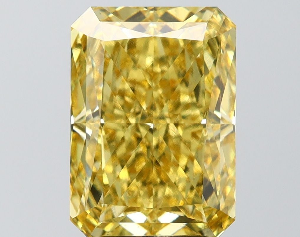 Loose Diamond - RADIANT 5.1ct Fancy Vivid Yellow VS1: Loose Diamond - RADIANT 5.1ct Fancy Vivid Yellow VS1 Source: This is a real non-mined Diamond that has been grown in a lab Shape: RADIANT Carats: 5.1 Color: Fancy Vivid Yellow Certification: IGI Video