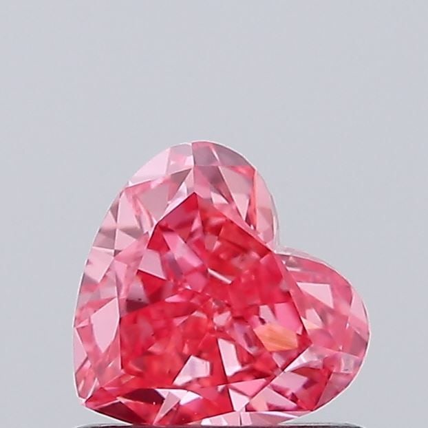 Loose Diamond - HEART 0.62ct Fancy Vivid Pink VS1: Loose Diamond - HEART 0.62ct Fancy Vivid Pink VS1 Source: This is a real non-mined Diamond that has been grown in a lab Shape: HEART Carats: 0.62 Color: Fancy Vivid Pink Certification: IGI Video: