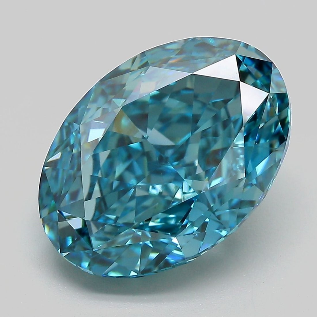 Loose Diamond - OVAL 8.39ct Fancy Vivid Greenish Blue VVS2: Loose Diamond - OVAL 8.39ct Fancy Vivid Greenish Blue VVS2 Source: This is a real non-mined Diamond that has been grown in a lab Shape: OVAL Carats: 8.39 Color: Fancy Vivid Greenish Blue Certification