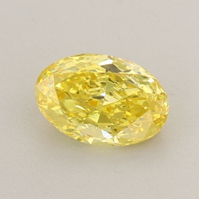 Loose Diamond - OVAL 0.66ct Fancy Vivid Yellow VS1: Loose Diamond - OVAL 0.66ct Fancy Vivid Yellow VS1 Source: This is a real non-mined Diamond that has been grown in a lab Shape: OVAL Carats: 0.66 Color: Fancy Vivid Yellow Certification: IGI Video: