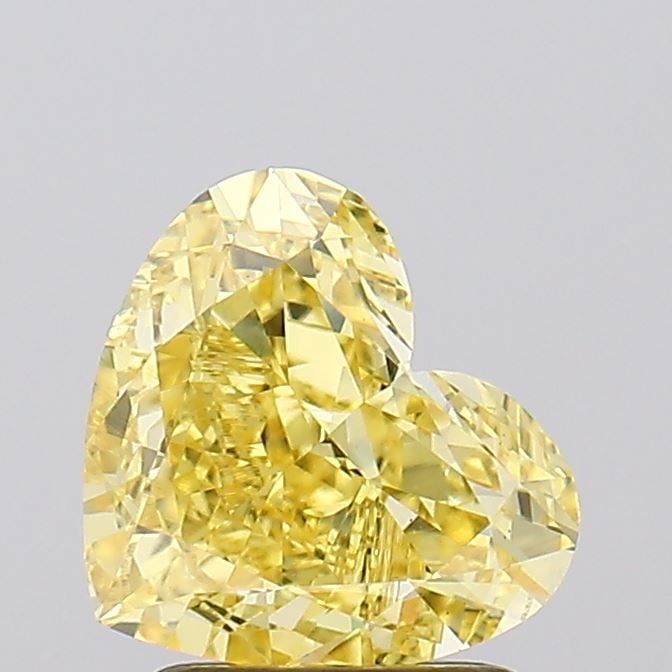 Loose Diamond - HEART 2.07ct Fancy Vivid Yellow VS1: Loose Diamond - HEART 2.07ct Fancy Vivid Yellow VS1 Source: This is a real non-mined Diamond that has been grown in a lab Shape: HEART Carats: 2.07 Color: Fancy Vivid Yellow Certification: IGI Video: