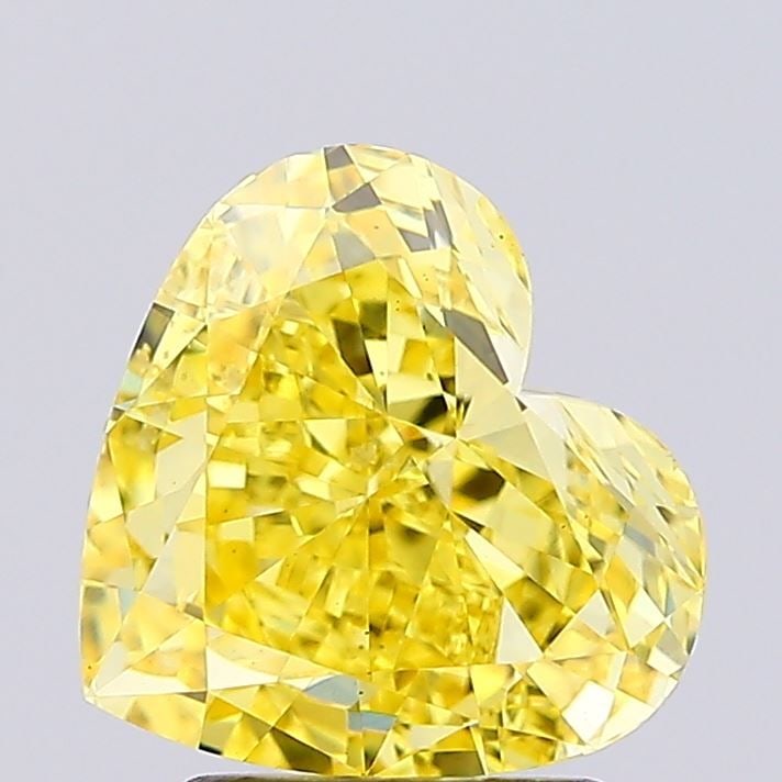 Loose Diamond - HEART 3.02ct Fancy Vivid Yellow VS2: Loose Diamond - HEART 3.02ct Fancy Vivid Yellow VS2 Source: This is a real non-mined Diamond that has been grown in a lab Shape: HEART Carats: 3.02 Color: Fancy Vivid Yellow Certification: IGI Video: