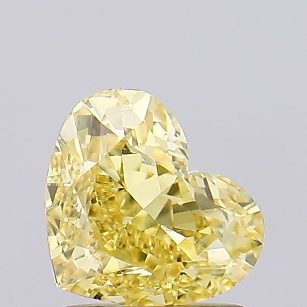 Loose Diamond - HEART 1.53ct Fancy Vivid Yellow VVS2: Loose Diamond - HEART 1.53ct Fancy Vivid Yellow VVS2 Source: This is a real non-mined Diamond that has been grown in a lab Shape: HEART Carats: 1.53 Color: Fancy Vivid Yellow Certification: IGI Video: