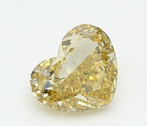 Loose Diamond - HEART 1.01ct Fancy Vivid Yellow SI1: Loose Diamond - HEART 1.01ct Fancy Vivid Yellow SI1 Source: This is a real non-mined Diamond that has been grown in a lab Shape: HEART Carats: 1.01 Color: Fancy Vivid Yellow Certification: IGI Video: