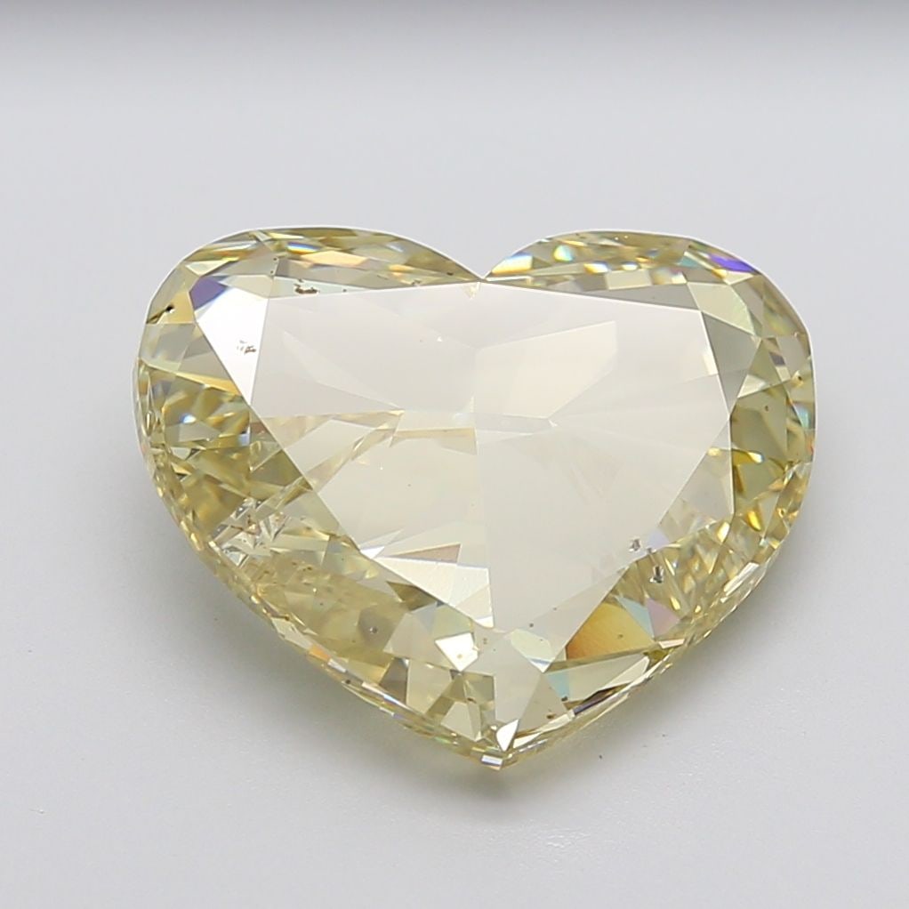Loose Diamond - HEART 11.03ct Fancy Light Yellow VS2: Loose Diamond - HEART 11.03ct Fancy Light Yellow VS2 Source: This is a real non-mined Diamond that has been grown in a lab Shape: HEART Carats: 11.03 Color: Fancy Light Yellow Certification: IGI The D