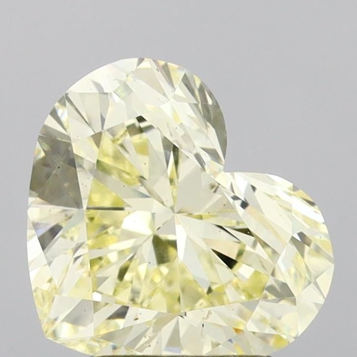 Loose Diamond - HEART 2.51ct Fancy Light Yellow VS2: Loose Diamond - HEART 2.51ct Fancy Light Yellow VS2 Source: This is a real non-mined Diamond that has been grown in a lab Shape: HEART Carats: 2.51 Color: Fancy Light Yellow Certification: IGI Video:
