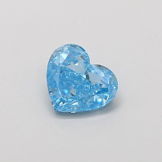 Loose Diamond - HEART 0.63ct Fancy Vivid Blue VS1: Loose Diamond - HEART 0.63ct Fancy Vivid Blue VS1 Source: This is a real non-mined Diamond that has been grown in a lab Shape: HEART Carats: 0.63 Color: Fancy Vivid Blue Certification: IGI Video: