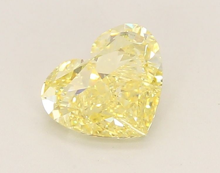 Loose Diamond - HEART 1.1ct Fancy Intense Yellow VS1: Loose Diamond - HEART 1.1ct Fancy Intense Yellow VS1 Source: This is a real non-mined Diamond that has been grown in a lab Shape: HEART Carats: 1.1 Color: Fancy Intense Yellow Certification: IGI Video