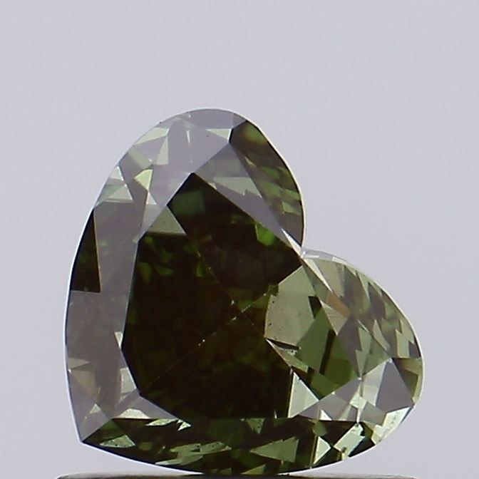 Loose Diamond - HEART 0.78ct Fancy Deep Green VS2: Loose Diamond - HEART 0.78ct Fancy Deep Green VS2 Source: This is a real non-mined Diamond that has been grown in a lab Shape: HEART Carats: 0.78 Color: Fancy Deep Green Certification: IGI Video: