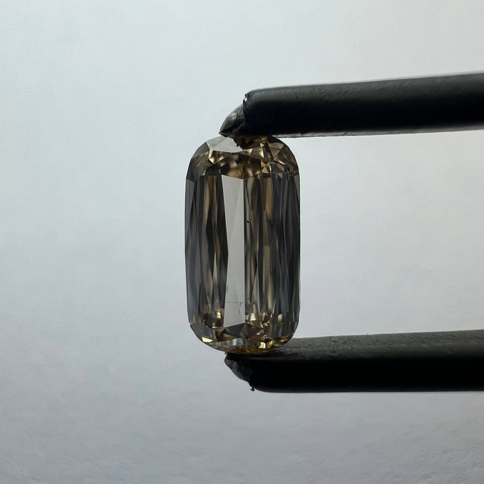 Loose Diamond - CUSHION BRILLIANT 0.62ct Orange VS2: Loose Diamond - CUSHION BRILLIANT 0.62ct Orange VS2 Source: This is a real non-mined Diamond that has been grown in a lab Shape: CUSHION BRILLIANT Carats: 0.62 Color: Orange Certification: NONE The Di
