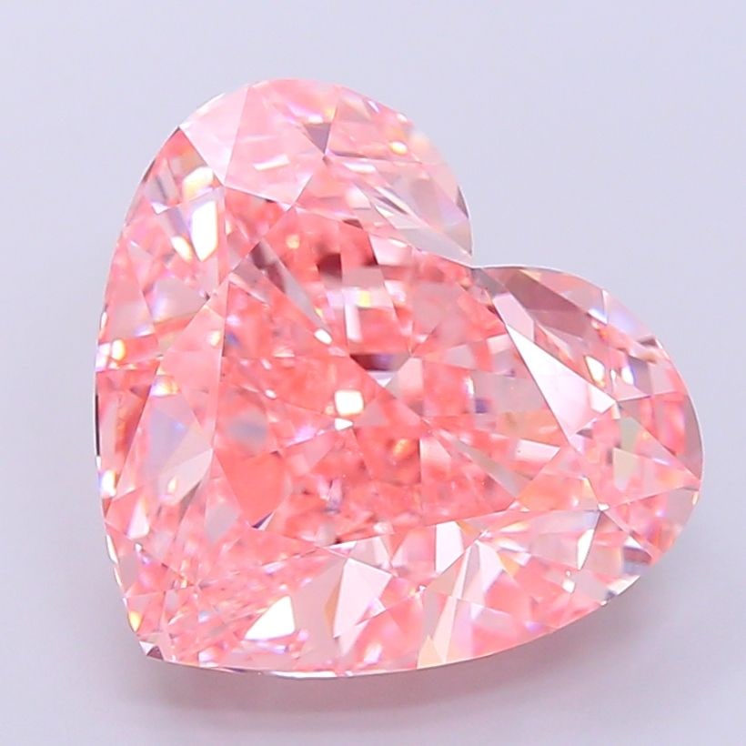 Loose Diamond - HEART 12.08ct Fancy Vivid Pink VVS2: Loose Diamond - HEART 12.08ct Fancy Vivid Pink VVS2 Source: This is a real non-mined Diamond that has been grown in a lab Shape: HEART Carats: 12.08 Color: Fancy Vivid Pink Certification: IGI Video:
