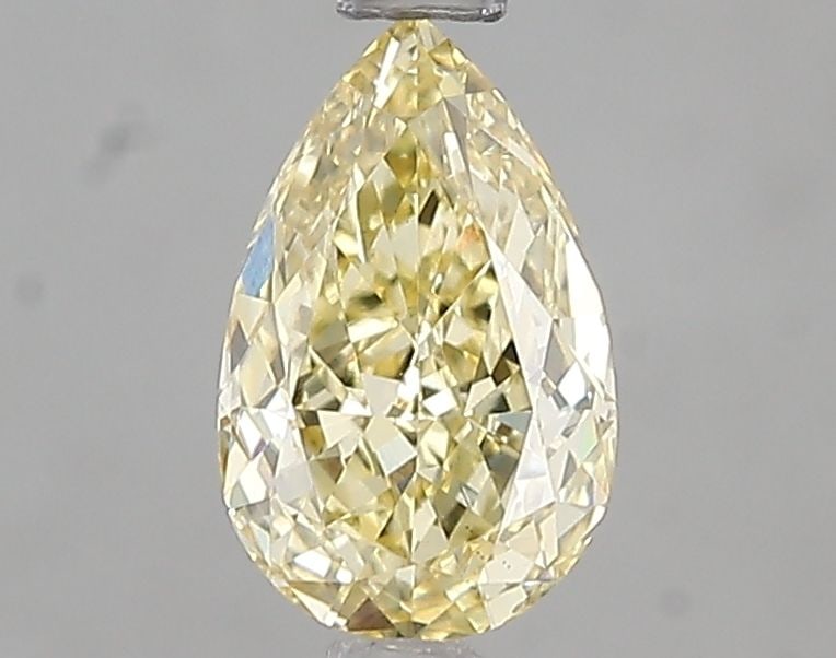 Loose Diamond - PEAR 1.03ct Fancy Yellow VS1: Loose Diamond - PEAR 1.03ct Fancy Yellow VS1 Source: This is a real non-mined Diamond that has been grown in a lab Shape: PEAR Carats: 1.03 Color: Fancy Yellow Certification: IGI Video: