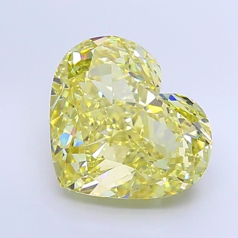Loose Diamond - HEART 13.28ct Fancy Intense Yellow VVS2: Loose Diamond - HEART 13.28ct Fancy Intense Yellow VVS2 Source: This is a real non-mined Diamond that has been grown in a lab Shape: HEART Carats: 13.28 Color: Fancy Intense Yellow Certification: IGI 