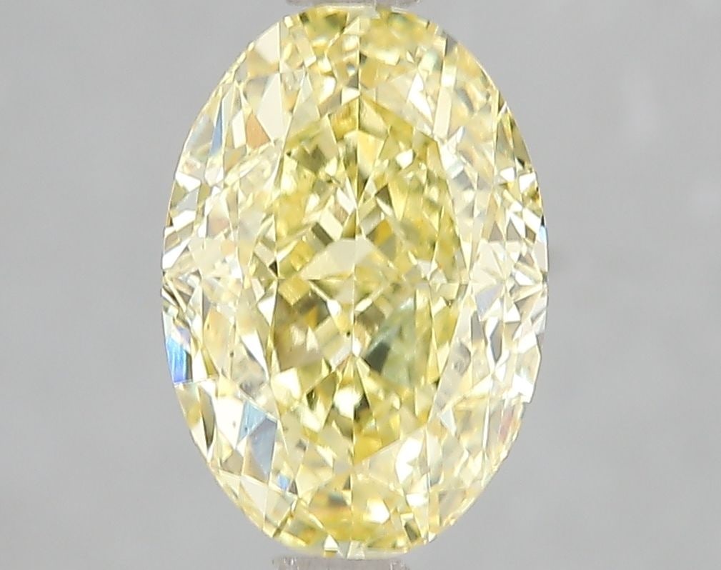 Loose Diamond - OVAL 3.05ct Fancy Vivid Yellow VS2: Loose Diamond - OVAL 3.05ct Fancy Vivid Yellow VS2 Source: This is a real non-mined Diamond that has been grown in a lab Shape: OVAL Carats: 3.05 Color: Fancy Vivid Yellow Certification: IGI Video: