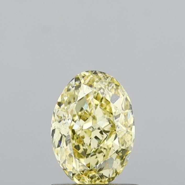 Loose Diamond - OVAL 1.0ct Fancy Yellow VVS2: Loose Diamond - OVAL 1.0ct Fancy Yellow VVS2 Source: This is a real non-mined Diamond that has been grown in a lab Shape: OVAL Carats: 1.0 Color: Fancy Yellow Certification: IGI Video: