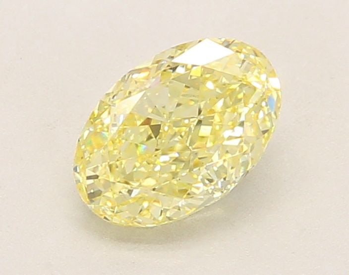 Loose Diamond - OVAL 1.12ct Fancy Yellow VVS2: Loose Diamond - OVAL 1.12ct Fancy Yellow VVS2 Source: This is a real non-mined Diamond that has been grown in a lab Shape: OVAL Carats: 1.12 Color: Fancy Yellow Certification: IGI Video: