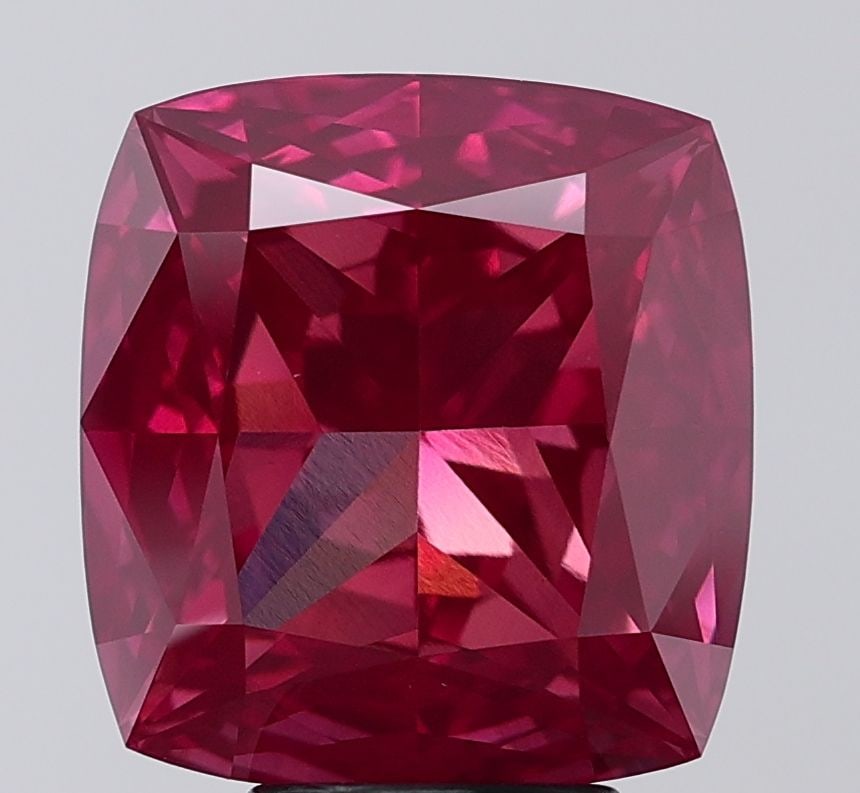Loose Diamond - CUSHION BRILLIANT 7.16ct Fancy Vivid Pink VVS2: Loose Diamond - CUSHION BRILLIANT 7.16ct Fancy Vivid Pink VVS2 Source: This is a real non-mined Diamond that has been grown in a lab Shape: CUSHION BRILLIANT Carats: 7.16 Color: Fancy Vivid Pink Certi