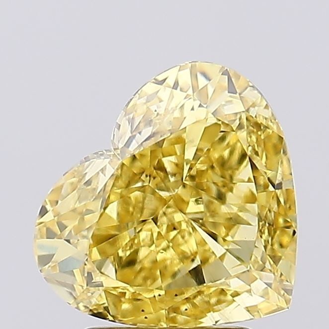 Loose Diamond - HEART 3.23ct Fancy Vivid Yellow SI1: Loose Diamond - HEART 3.23ct Fancy Vivid Yellow SI1 Source: This is a real non-mined Diamond that has been grown in a lab Shape: HEART Carats: 3.23 Color: Fancy Vivid Yellow Certification: IGI Video: