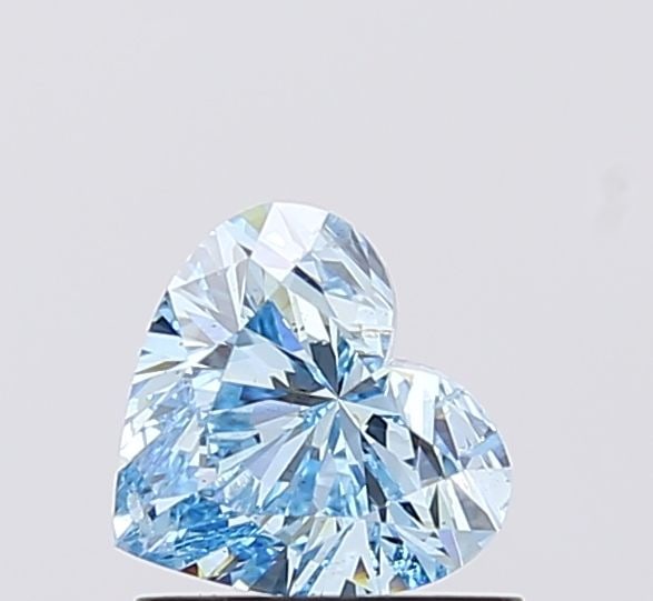 Loose Diamond - HEART 0.9ct Fancy Vivid Blue SI1: Loose Diamond - HEART 0.9ct Fancy Vivid Blue SI1 Source: This is a real non-mined Diamond that has been grown in a lab Shape: HEART Carats: 0.9 Color: Fancy Vivid Blue Certification: IGI Video: