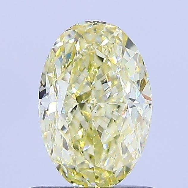 Loose Diamond - OVAL 0.81ct Fancy Vivid Yellow VS1: Loose Diamond - OVAL 0.81ct Fancy Vivid Yellow VS1 Source: This is a real non-mined Diamond that has been grown in a lab Shape: OVAL Carats: 0.81 Color: Fancy Vivid Yellow Certification: NONE Video: