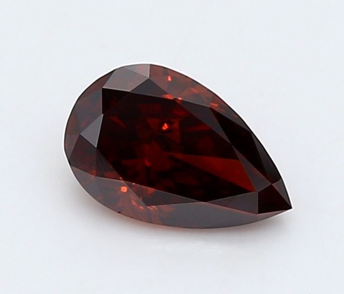 Loose Diamond - PEAR 0.32ct Fancy Deep Orange VVS2: Loose Diamond - PEAR 0.32ct Fancy Deep Orange VVS2 Source: This is a real non-mined Diamond that has been grown in a lab Shape: PEAR Carats: 0.32 Color: Fancy Deep Orange Certification: IGI Video: