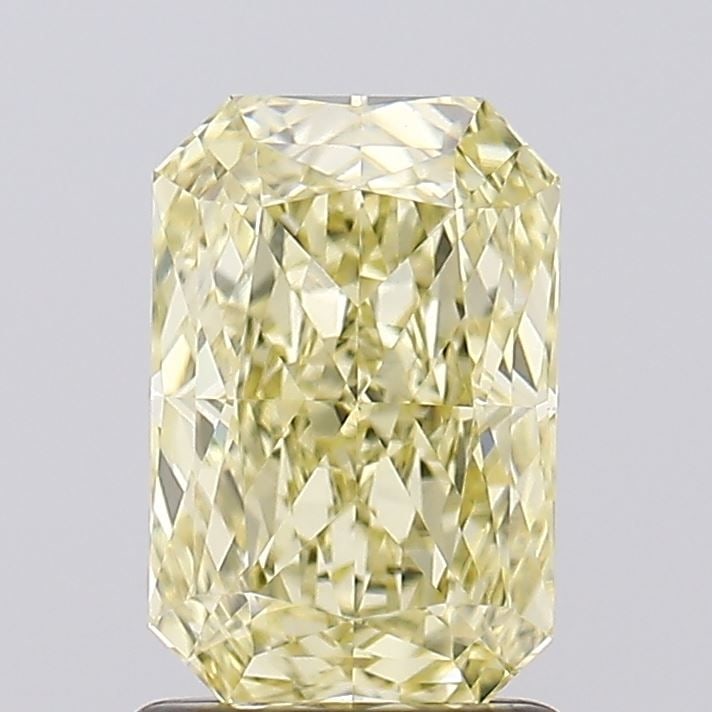 Loose Diamond - RADIANT 1.55ct Fancy Yellow VVS2: Loose Diamond - RADIANT 1.55ct Fancy Yellow VVS2 Source: This is a real non-mined Diamond that has been grown in a lab Shape: RADIANT Carats: 1.55 Color: Fancy Yellow Certification: IGI Video: