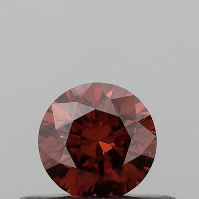 Loose Diamond - ROUND 0.33ct Fancy Deep Orange VS1: Loose Diamond - ROUND 0.33ct Fancy Deep Orange VS1 Source: This is a real non-mined Diamond that has been grown in a lab Shape: ROUND Carats: 0.33 Color: Fancy Deep Orange Certification: IGI Video: