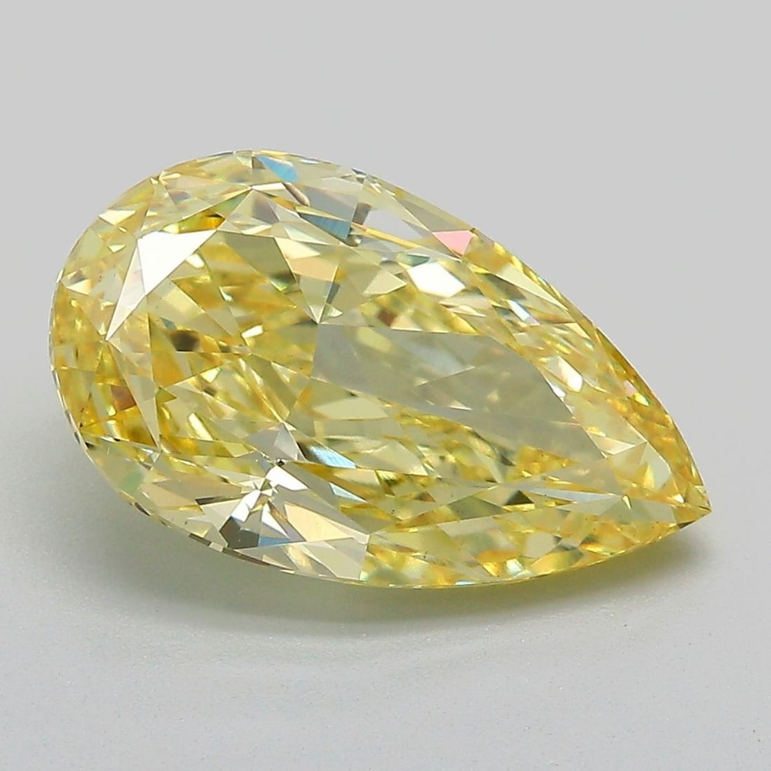 Loose Diamond - PEAR 4.12ct Fancy Vivid Yellow VS1: Loose Diamond - PEAR 4.12ct Fancy Vivid Yellow VS1 Source: This is a real non-mined Diamond that has been grown in a lab Shape: PEAR Carats: 4.12 Color: Fancy Vivid Yellow Certification: IGI Video: