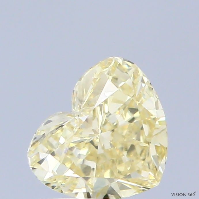 Loose Diamond - HEART 0.73ct Fancy Yellow VS1: Loose Diamond - HEART 0.73ct Fancy Yellow VS1 Source: This is a real non-mined Diamond that has been grown in a lab Shape: HEART Carats: 0.73 Color: Fancy Yellow Certification: IGI Video: