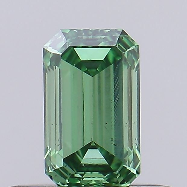 Loose Diamond - EMERALD 0.33ct Fancy Vivid Green VS2: Loose Diamond - EMERALD 0.33ct Fancy Vivid Green VS2 Source: This is a real non-mined Diamond that has been grown in a lab Shape: EMERALD Carats: 0.33 Color: Fancy Vivid Green Certification: IGI Video