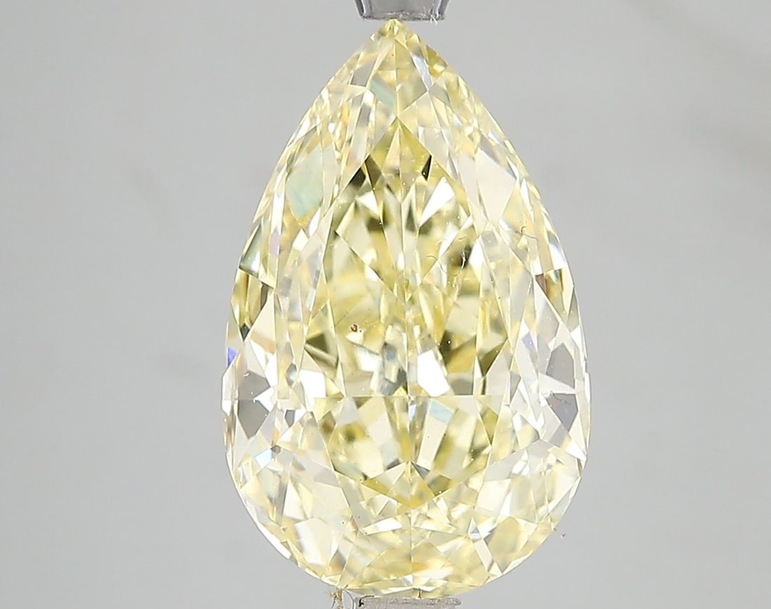 Loose Diamond - PEAR 5.01ct Fancy Vivid Yellow VS1: Loose Diamond - PEAR 5.01ct Fancy Vivid Yellow VS1 Source: This is a real non-mined Diamond that has been grown in a lab Shape: PEAR Carats: 5.01 Color: Fancy Vivid Yellow Certification: IGI Video: