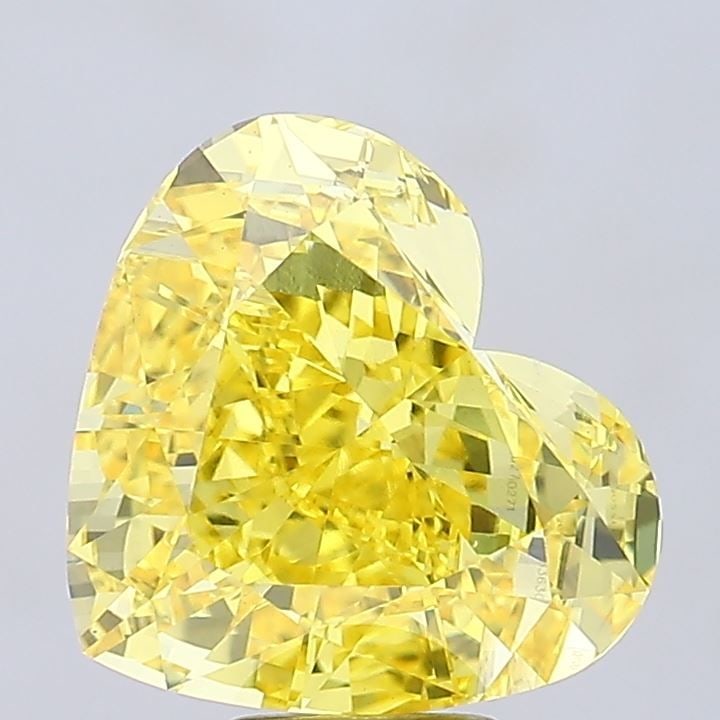 Loose Diamond - HEART 9.81ct Fancy Vivid Yellow VS2: Loose Diamond - HEART 9.81ct Fancy Vivid Yellow VS2 Source: This is a real non-mined Diamond that has been grown in a lab Shape: HEART Carats: 9.81 Color: Fancy Vivid Yellow Certification: IGI Video: