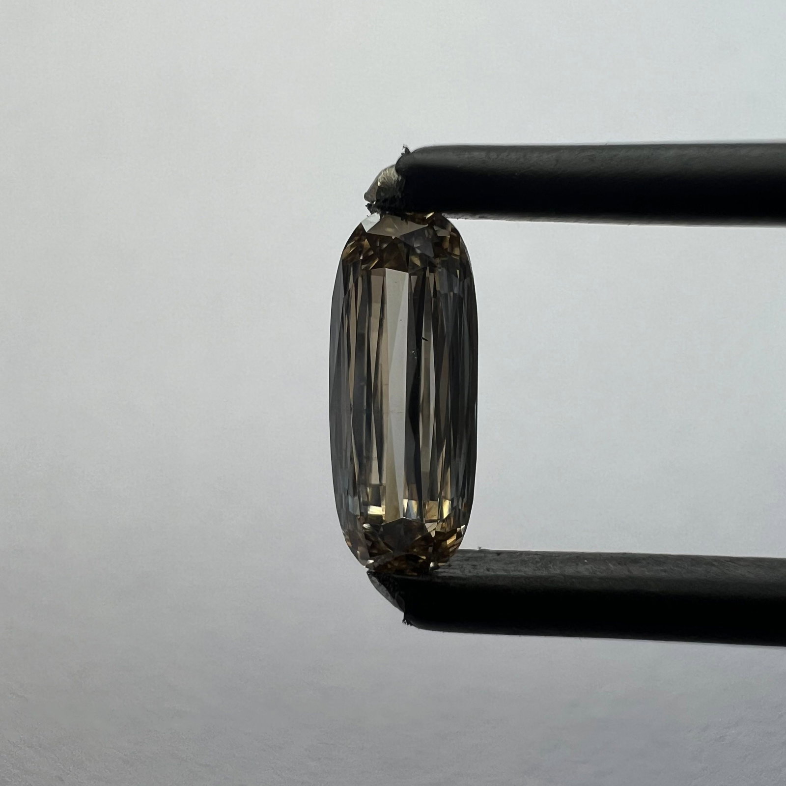 Loose Diamond - CUSHION BRILLIANT 0.57ct Brown VS2: Loose Diamond - CUSHION BRILLIANT 0.57ct Brown VS2 Source: This is a real non-mined Diamond that has been grown in a lab Shape: CUSHION BRILLIANT Carats: 0.57 Color: Brown Certification: NONE The Diam