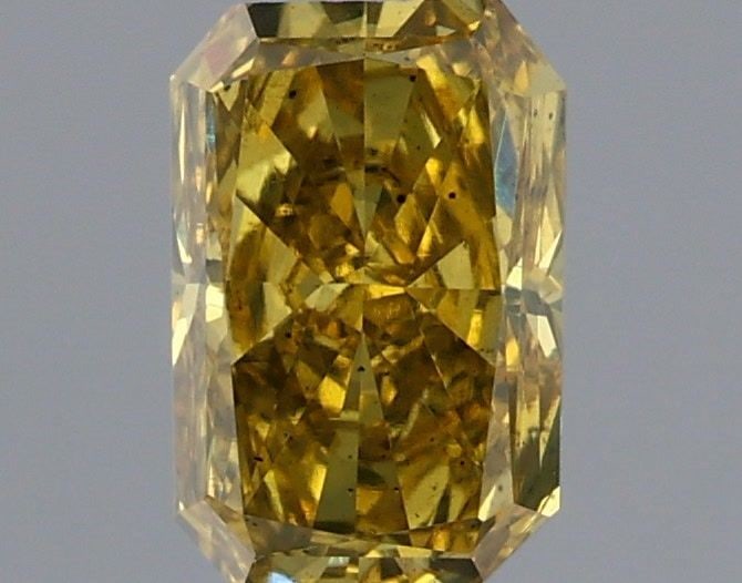 Loose Diamond - RADIANT 0.85ct Fancy Intense Yellow SI1: Loose Diamond - RADIANT 0.85ct Fancy Intense Yellow SI1 Source: This is a real non-mined Diamond that has been grown in a lab Shape: RADIANT Carats: 0.85 Color: Fancy Intense Yellow Certification: IGI