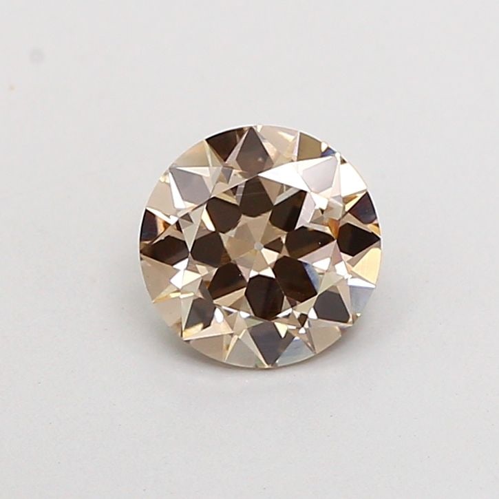 Loose Diamond - ROUND 1.1ct Fancy Light Brown VVS2: Loose Diamond - ROUND 1.1ct Fancy Light Brown VVS2 Source: This is a real non-mined Diamond that has been grown in a lab Shape: ROUND Carats: 1.1 Color: Fancy Light Brown Certification: IGI Video: