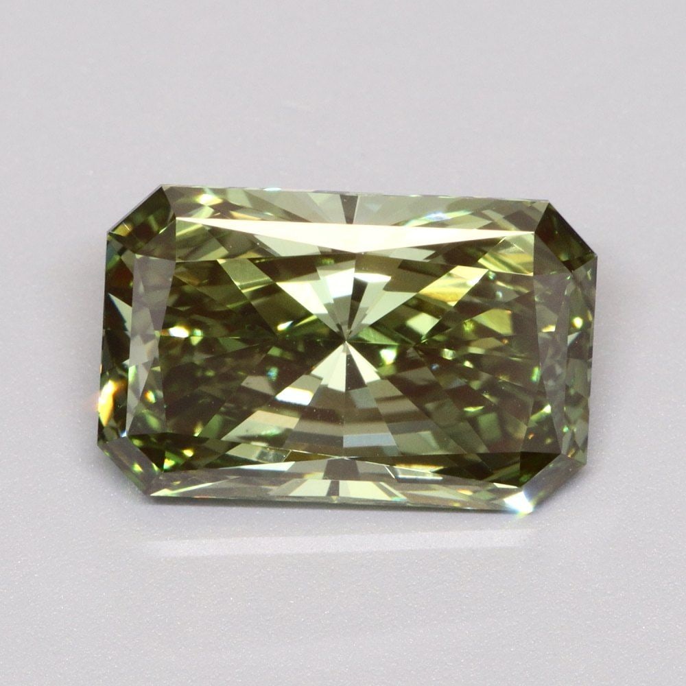 Loose Diamond - RADIANT 3.02ct Fancy Vivid Green VVS2: Loose Diamond - RADIANT 3.02ct Fancy Vivid Green VVS2 Source: This is a real non-mined Diamond that has been grown in a lab Shape: RADIANT Carats: 3.02 Color: Fancy Vivid Green Certification: IGI Vide
