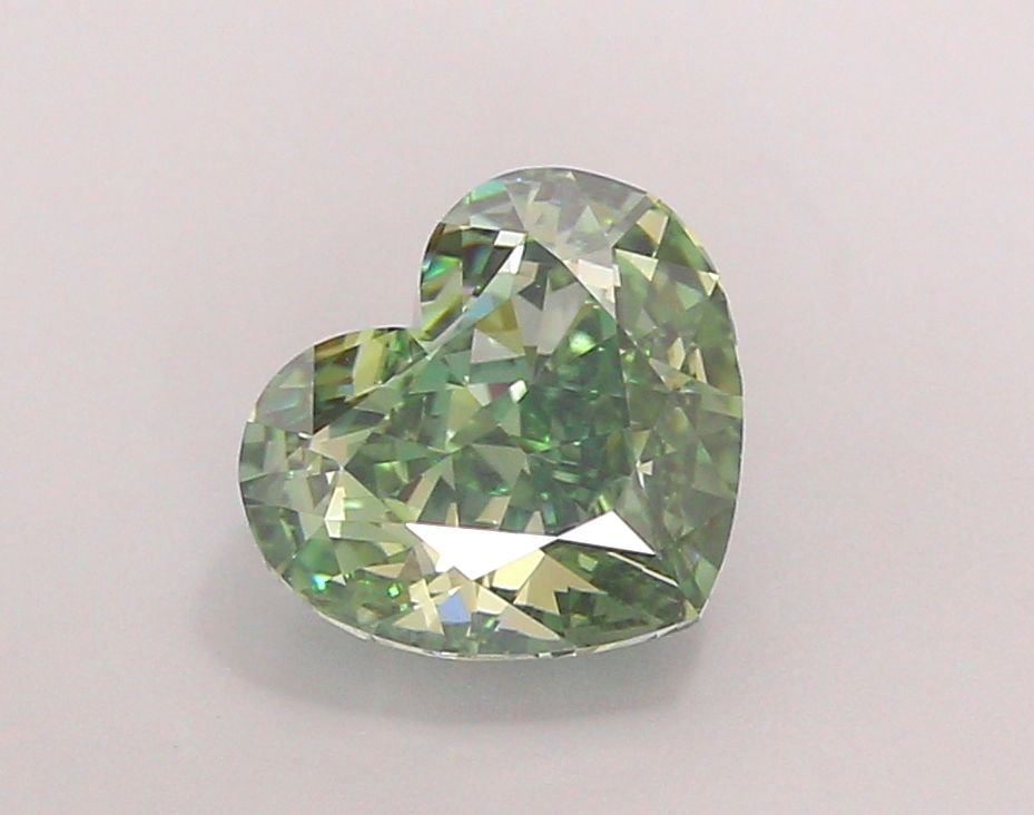 Loose Diamond - HEART 3.36ct Fancy Vivid Green VVS2: Loose Diamond - HEART 3.36ct Fancy Vivid Green VVS2 Source: This is a real non-mined Diamond that has been grown in a lab Shape: HEART Carats: 3.36 Color: Fancy Vivid Green Certification: IGI Video: