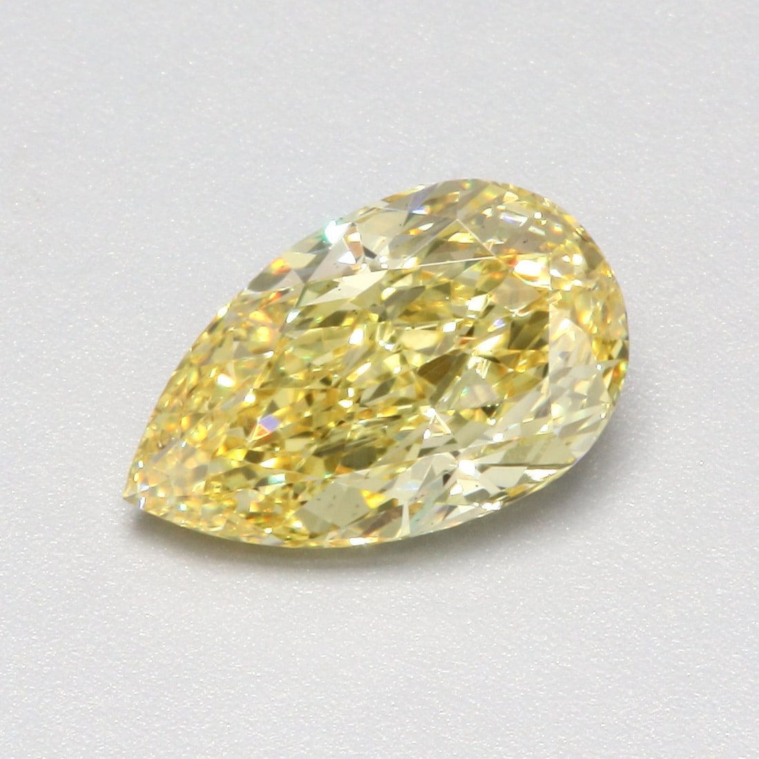 Loose Diamond - PEAR 1.5ct Fancy Vivid Yellow VS2: Loose Diamond - PEAR 1.5ct Fancy Vivid Yellow VS2 Source: This is a real non-mined Diamond that has been grown in a lab Shape: PEAR Carats: 1.5 Color: Fancy Vivid Yellow Certification: IGI Video: