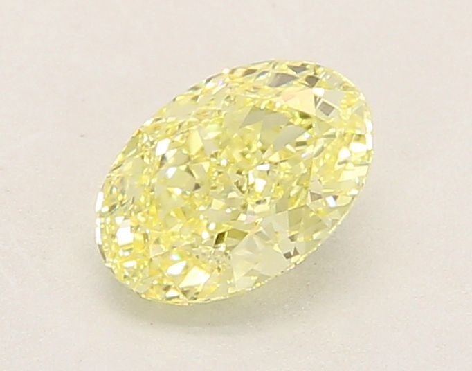 Loose Diamond - OVAL 1.07ct Fancy Yellow VS1: Loose Diamond - OVAL 1.07ct Fancy Yellow VS1 Source: This is a real non-mined Diamond that has been grown in a lab Shape: OVAL Carats: 1.07 Color: Fancy Yellow Certification: IGI Video: