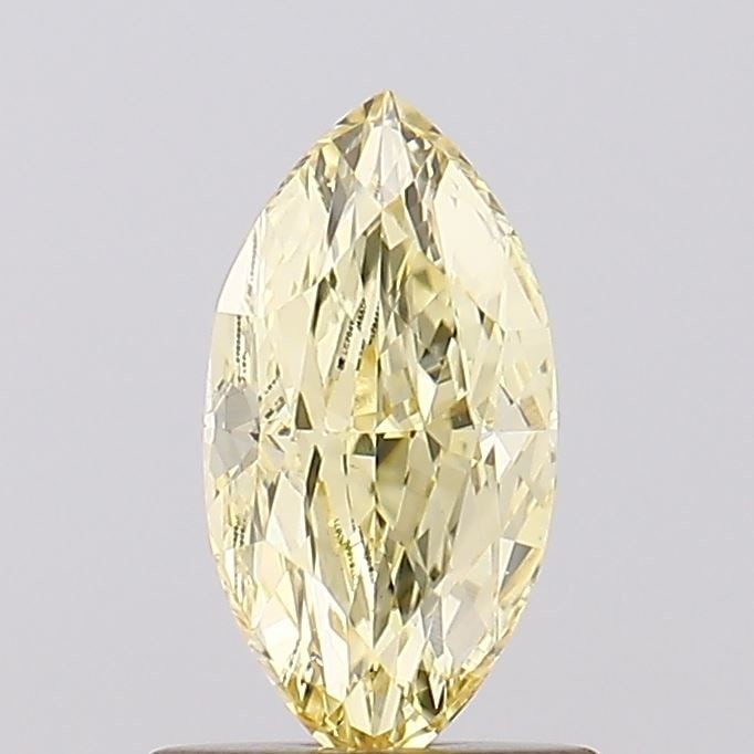 Loose Diamond - MARQUISE 1.0ct Fancy Yellow VS2: Loose Diamond - MARQUISE 1.0ct Fancy Yellow VS2 Source: This is a real non-mined Diamond that has been grown in a lab Shape: MARQUISE Carats: 1.0 Color: Fancy Yellow Certification: IGI Video: