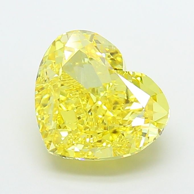 Loose Diamond - HEART 5.52ct Fancy Vivid Yellow VS1: Loose Diamond - HEART 5.52ct Fancy Vivid Yellow VS1 Source: This is a real non-mined Diamond that has been grown in a lab Shape: HEART Carats: 5.52 Color: Fancy Vivid Yellow Certification: IGI Video: