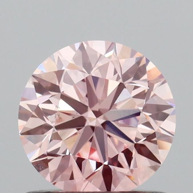 Loose Diamond - ROUND 0.9ct Fancy Intense Pink VS1: Loose Diamond - ROUND 0.9ct Fancy Intense Pink VS1 Source: This is a real non-mined Diamond that has been grown in a lab Shape: ROUND Carats: 0.9 Color: Fancy Intense Pink Certification: IGI Video: