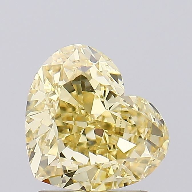 Loose Diamond - HEART 2.01ct Fancy Yellow VVS2: Loose Diamond - HEART 2.01ct Fancy Yellow VVS2 Source: This is a real non-mined Diamond that has been grown in a lab Shape: HEART Carats: 2.01 Color: Fancy Yellow Certification: IGI Video: