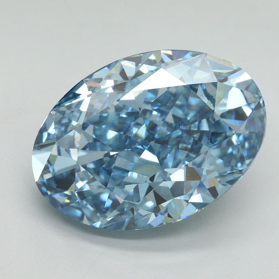 Loose Diamond - OVAL 12.55ct Fancy Vivid Blue VS1: Loose Diamond - OVAL 12.55ct Fancy Vivid Blue VS1 Source: This is a real non-mined Diamond that has been grown in a lab Shape: OVAL Carats: 12.55 Color: Fancy Vivid Blue Certification: IGI Video: