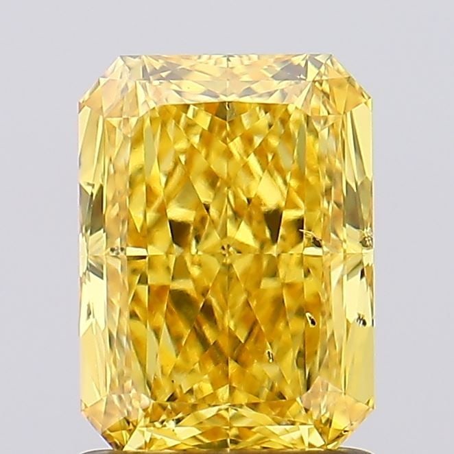 Loose Diamond - RADIANT 1.55ct Fancy Vivid Yellow SI2: Loose Diamond - RADIANT 1.55ct Fancy Vivid Yellow SI2 Source: This is a real non-mined Diamond that has been grown in a lab Shape: RADIANT Carats: 1.55 Color: Fancy Vivid Yellow Certification: IGI Vid