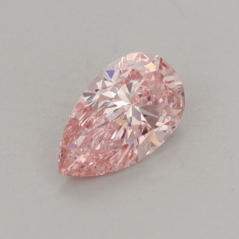 Loose Diamond - PEAR 0.7ct Fancy Vivid Pink VS1: Loose Diamond - PEAR 0.7ct Fancy Vivid Pink VS1 Source: This is a real non-mined Diamond that has been grown in a lab Shape: PEAR Carats: 0.7 Color: Fancy Vivid Pink Certification: IGI Video: