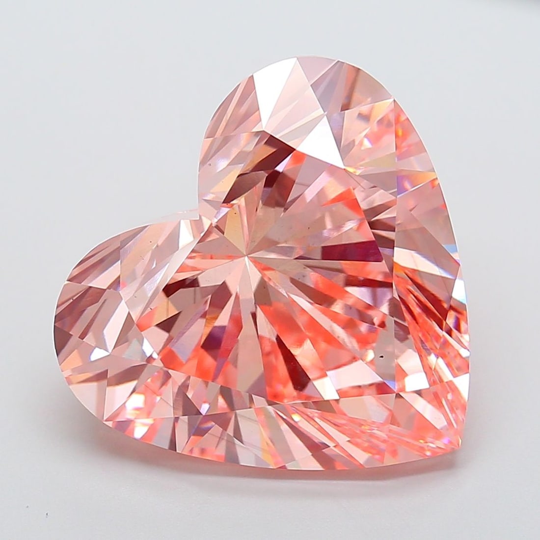 Loose Diamond - HEART 21.06ct Fancy Vivid Pink VS1: Loose Diamond - HEART 21.06ct Fancy Vivid Pink VS1 Source: This is a real non-mined Diamond that has been grown in a lab Shape: HEART Carats: 21.06 Color: Fancy Vivid Pink Certification: IGI Video: