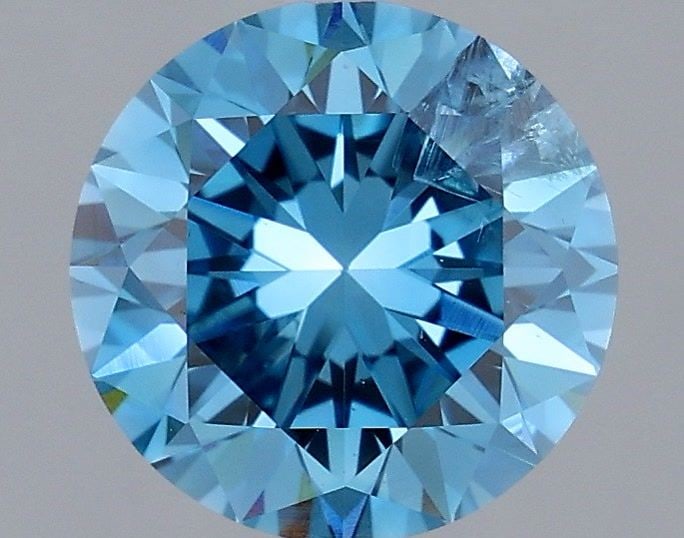 Loose Diamond - ROUND 2.13ct Fancy Vivid Blue I1: Loose Diamond - ROUND 2.13ct Fancy Vivid Blue I1 Source: This is a real non-mined Diamond that has been grown in a lab Shape: ROUND Carats: 2.13 Color: Fancy Vivid Blue Certification: IGI Video: